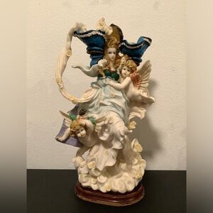 Angel Figurine with Cherubs Design